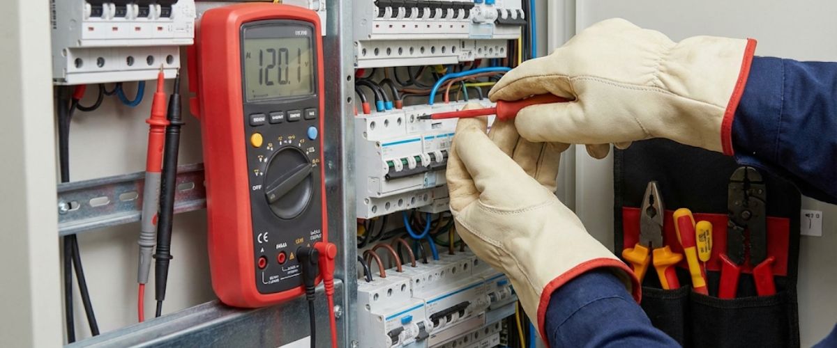 Electrician repairing switchboard circuit breaker Central Coast